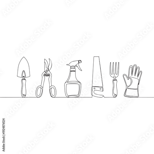 Gardening tools arranged in a line, essential for planting and cultivation
