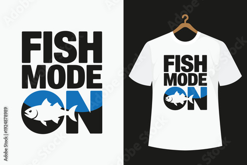 White t-shirt with black and blue fish mode on hanging on a wooden hanger