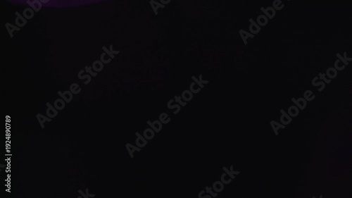 light leak and bokeh overlay with purple and green hues, perfect for adding artistic flair or transitions to video projects.