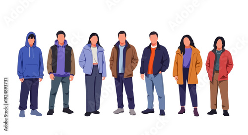 A diverse group of seven people, men and women, standing in a line wearing casual winter clothing.
