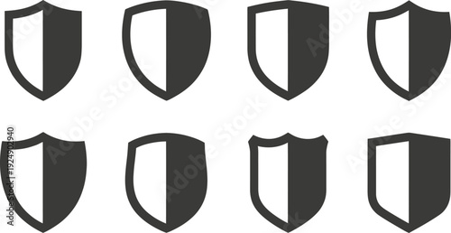 A collection of shield icons in black and white on a plain background