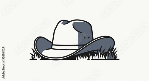 Stylized Cowboy Hat Resting on Grass, Minimalist Western Icon