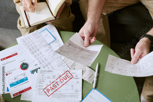 Photography Caucasian senior man and Caucasian senior woman reviewing overdue bills and fina