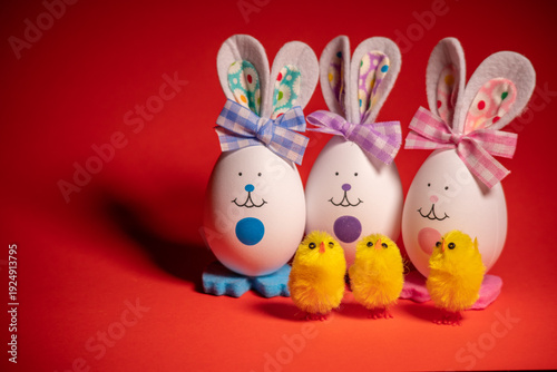 Easter eggs. funny hares. toy rabbit. toy egg. Festive spring scene featuring colorful Easter eggs and funny hares. An adorable toy rabbit sits beside a bright toy egg. Perfect for joyful holiday desi
