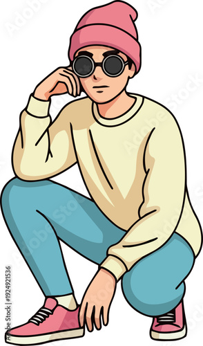 Young man crouching on the street, wearing casual clothing and sunglasses, engaged in a phone conversation