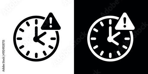 Black and white clock with warning signs exclamation mark