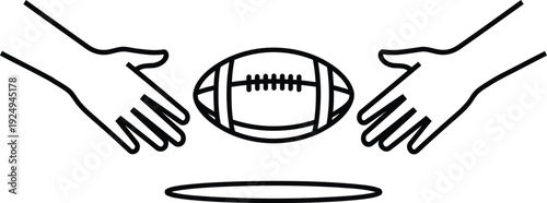 Two hands gently holding an american football above a ground surface