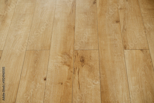 Εκτύπωση καμβά Close up of light brown wooden floor planks with subtle grain detail and slight