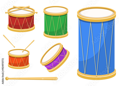 Collection of colorful drums with various sizes and drumsticks isolated.