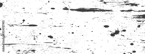 Monochrome grunge texture with ink splatters and distressed brush strokes on a white background
