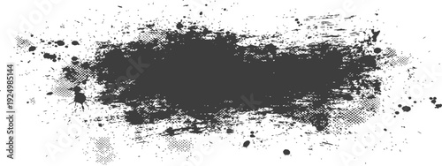 Grunge brush stroke with ink splatters and halftone texture in dark gray