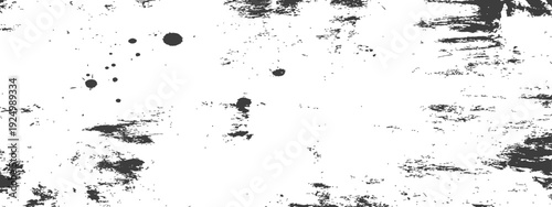 Grunge texture background with ink splatters and rough brush strokes in black and white