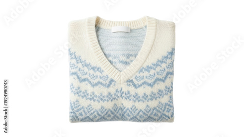 Bild auf Leinwand Isolated folded sweater vest with fair isle pattern ready for cozy autumn layeri