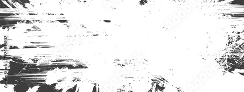 Distressed grunge brush stroke texture background in black and white