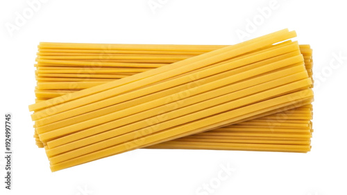 Photos Isolated dried uncooked fettuccine pasta ready for cooking, a staple ingredient
