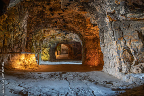 Luxembourg City Casemates catacombs interior - UNESCO World Heritage underground tunnels in rock with dramatic warm lighting