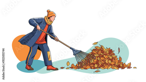 A person dressed in warm autumn clothes is raking a large pile of colorful fallen leaves in a seasonal yard cleanup.