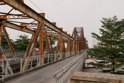 Urban Traffic Crossing an Old Steel Bridge