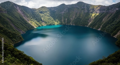 Serene Lake in Mountainous Landscape with Lush Greenery.