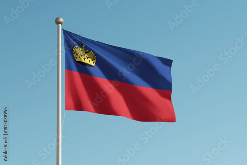 Liechtenstein national flag waving on pole against clear blue sky background.