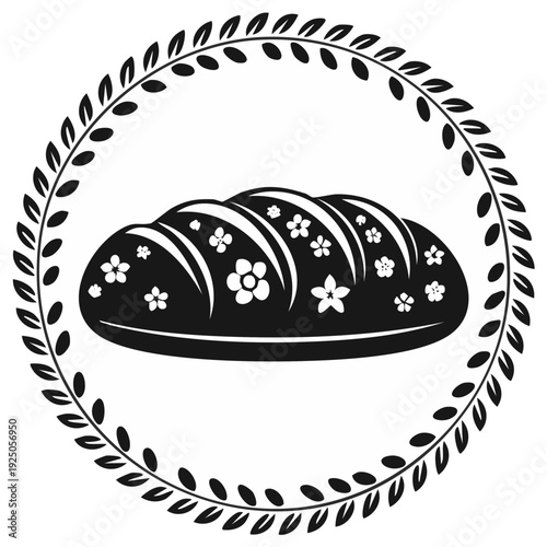 Black and white illustration of a loaf of bread with floral patterns inside a decorative leaf border