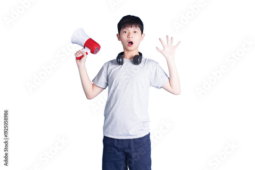 Fotografi Teenager's Outburst: A young teenager, microphone in hand, expresses himself with enthusiastic gesture, a snapshot of youthful exuberance and active communication