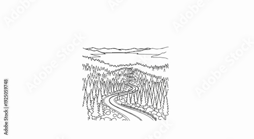 Winding road through forest towards distant hills and water