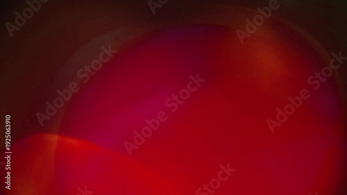 light leak and bokeh overlay with vibrant red and purple hues, perfect for adding atmosphere and visual flair to your projects. This is a great element to enhance videos.