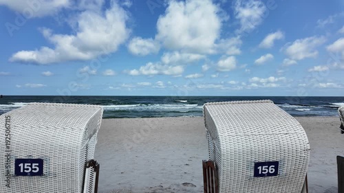 Walk between beach chairs to the sea
