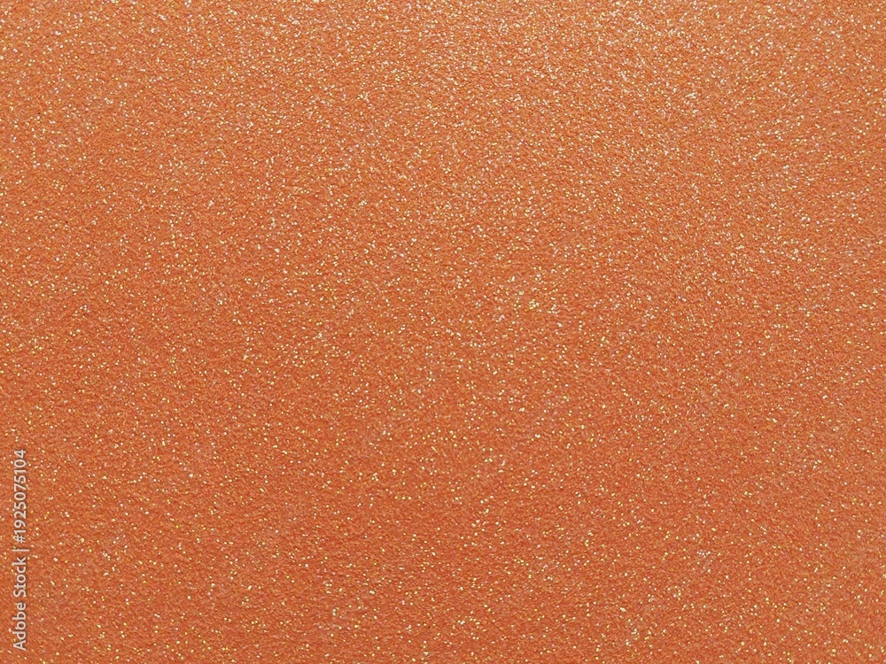 Fototapeta premium Shiny abstract orange glitter sparkle background texture. Glowing shimmer particles with sparkling surface effect.