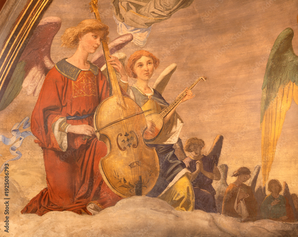 Obraz premium BUSTO ARSIZIO, ITALY - JANUARY 19, 2026: The fresco of angels with the music instruments in the church Santuario di Santa Maria di Piazza