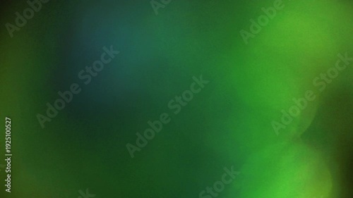 Light leak and bokeh overlay with green and blue hues, creating a dreamy, atmospheric effect. Perfect for adding visual flair to any project.
