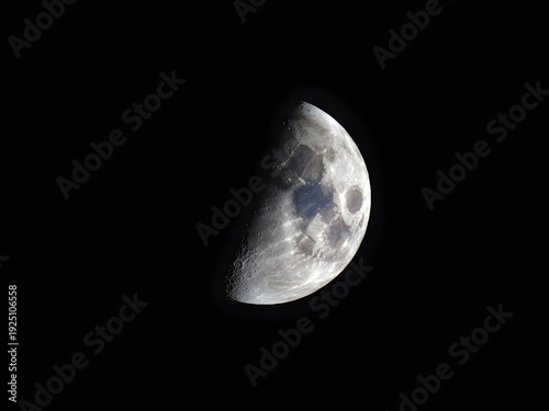 The moon is a crescent shape in space