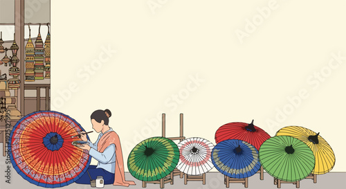Artisan painting a colorful traditional umbrella in a workshop with other umbrellas displayed