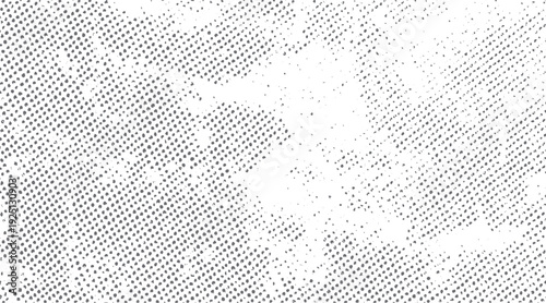 Gray dots pattern texture with white distressed areas and scattered small particles