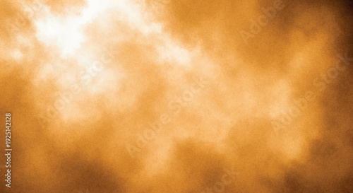 Warm glowing amber cloudscape background with soft diffused light dreamy atmospheric mist texture
