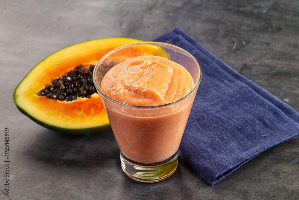 Naklejka premium Sweet juicy papaya smoothie detox