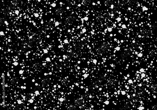 Confeti blanco sobre fondo negro. Salpicadura blanca sobre fondo negro. Nieve en la noche