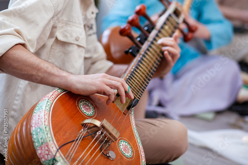 Obraz na plátně a man plays the sitar at a concert