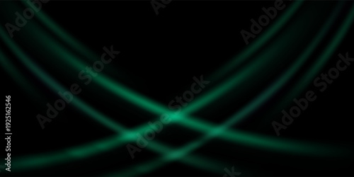 Abstract green light trails flowing across a dark black background, creating a smooth wave motion effect