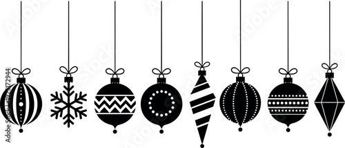 Set of black Christmas ornament silhouettes hanging on strings including snowflake and geometric bauble designs for festive holiday winter season graphic decoration