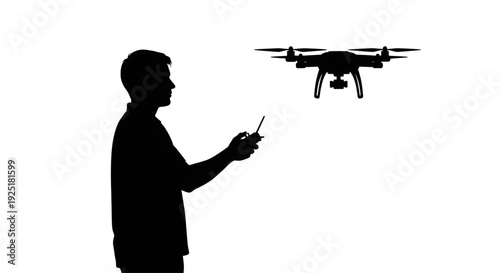 Silhouette of a businessman working at a desk with multiple floating digital screens and monitors