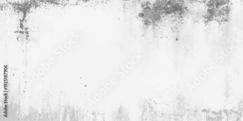 A vintage grey abstract grunge background featuring a dirty stone wall texture with a rough concrete surface and black and white paint pattern