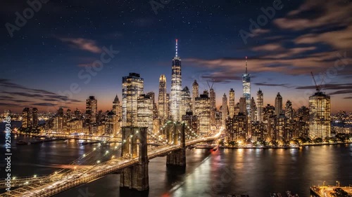 Sunset view of New York City skyline with Brooklyn Bridge and One World Trade Center in the background