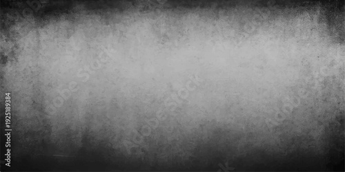 Dark aged grunge metal plate with a rough black stone texture and vintage gray concrete design for a dirty industrial wall backdrop