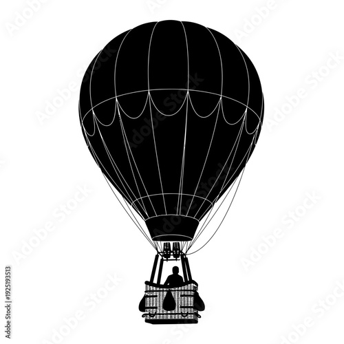 Silhouette of a hot air balloon with a person in the basket.
