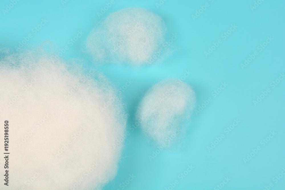 Ταπετσαρία Three fluffy pieces of white synthetic polyester fiber padding used for stuffing