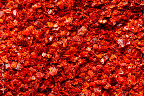 Foto Close-up of gochugaru, Korean chili pepper seedless flakes, background texture
