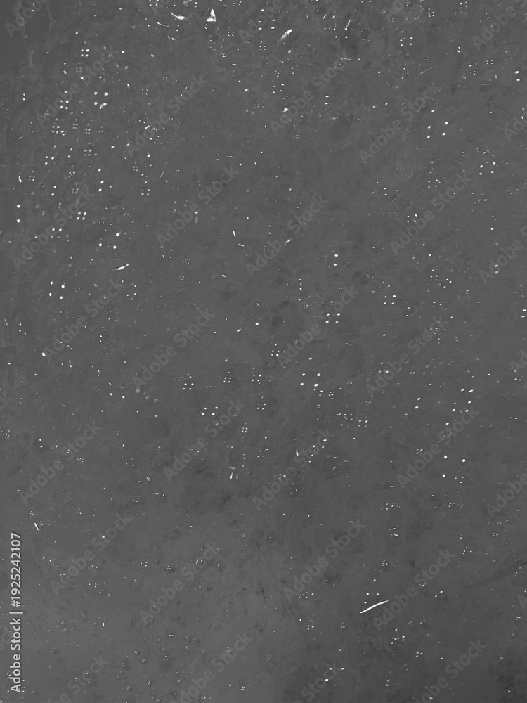 Obraz premium High-angle view dark grey surface with white sparkling dots