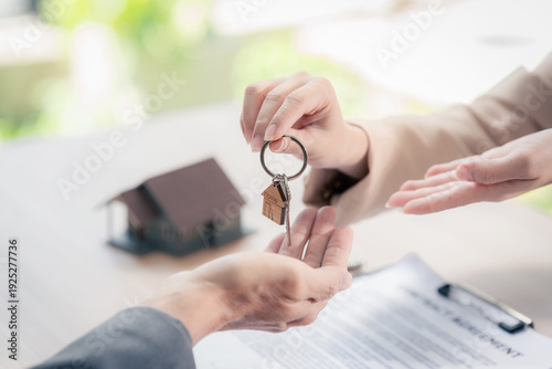 Real estate agents hand over the keys to a property to clients after they sign a lease agreement for an apartment or house with the landlord. Real estate agents also handle mortgage loan agreements wi